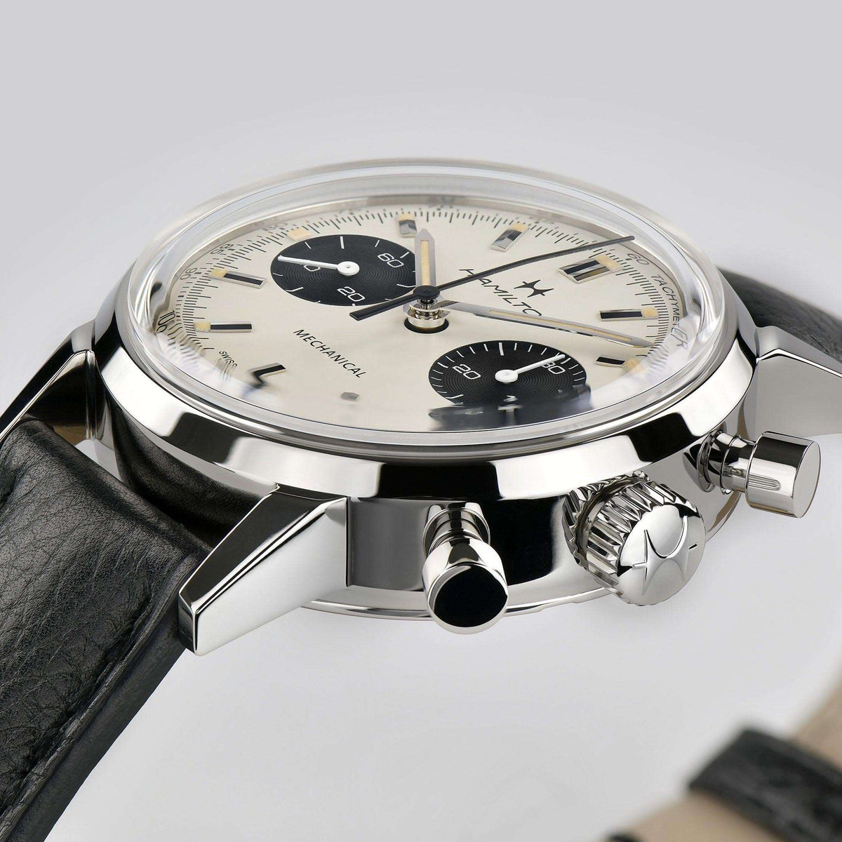 Hamilton chronograph watch with white dial, black subdials, push-button crown on leather strap