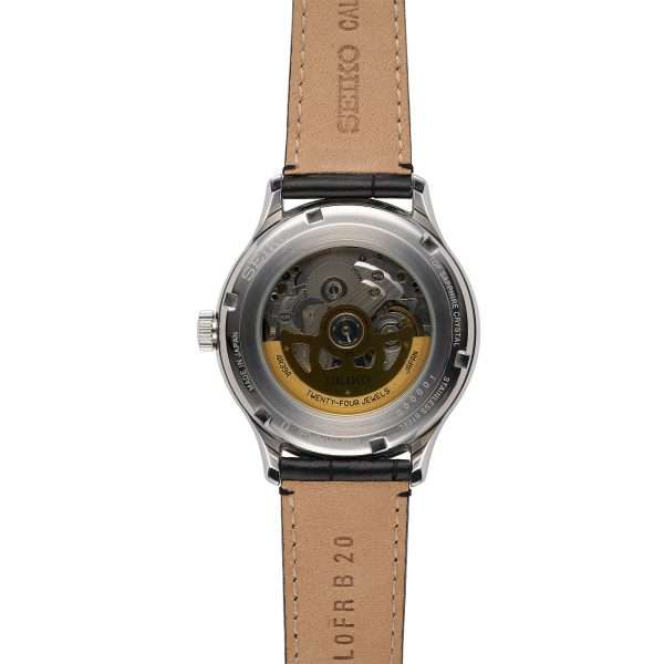 Seiko Presage skeleton caseback with exposed movement and tan leather strap