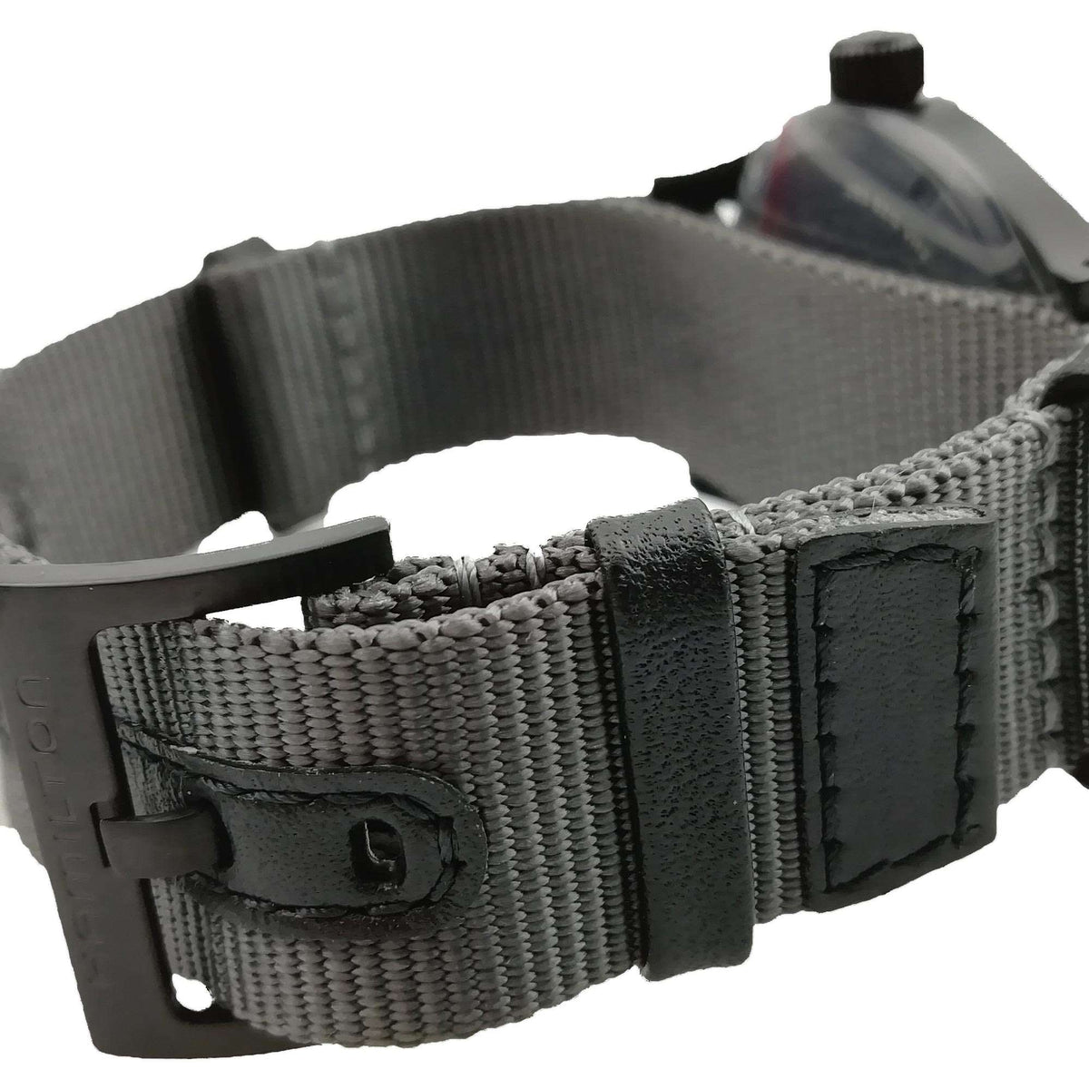 Hamilton Khaki Field H69409930 black NATO strap and pin buckle watch on white background