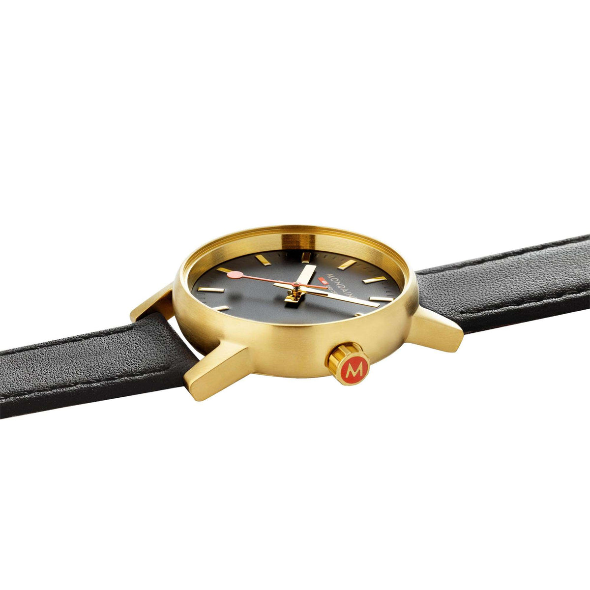 Gold-tone watch case with crown detail and black leather strap, side view