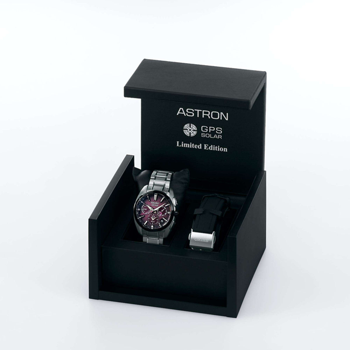Limited edition GPS solar watch in open black display box with steel bracelet