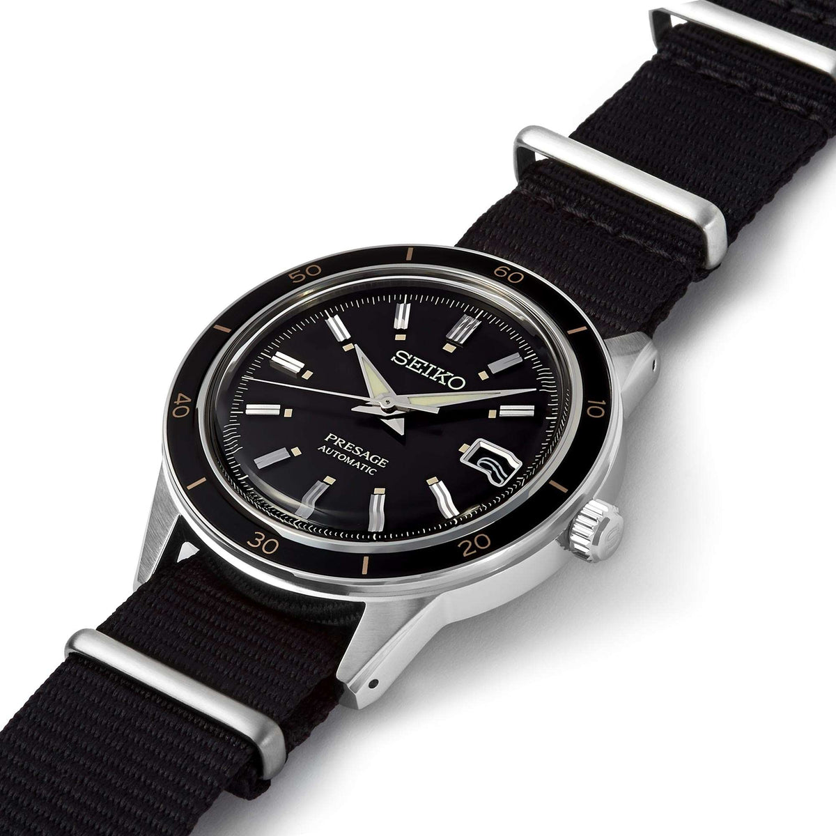 Angled view of black-dial Seiko Presage automatic watch with black fabric strap
