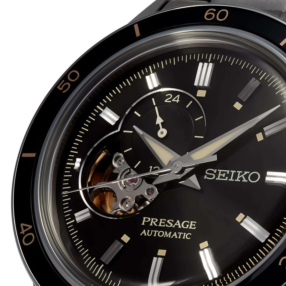 Seiko Presage automatic watch close-up with black dial and visible inner movement