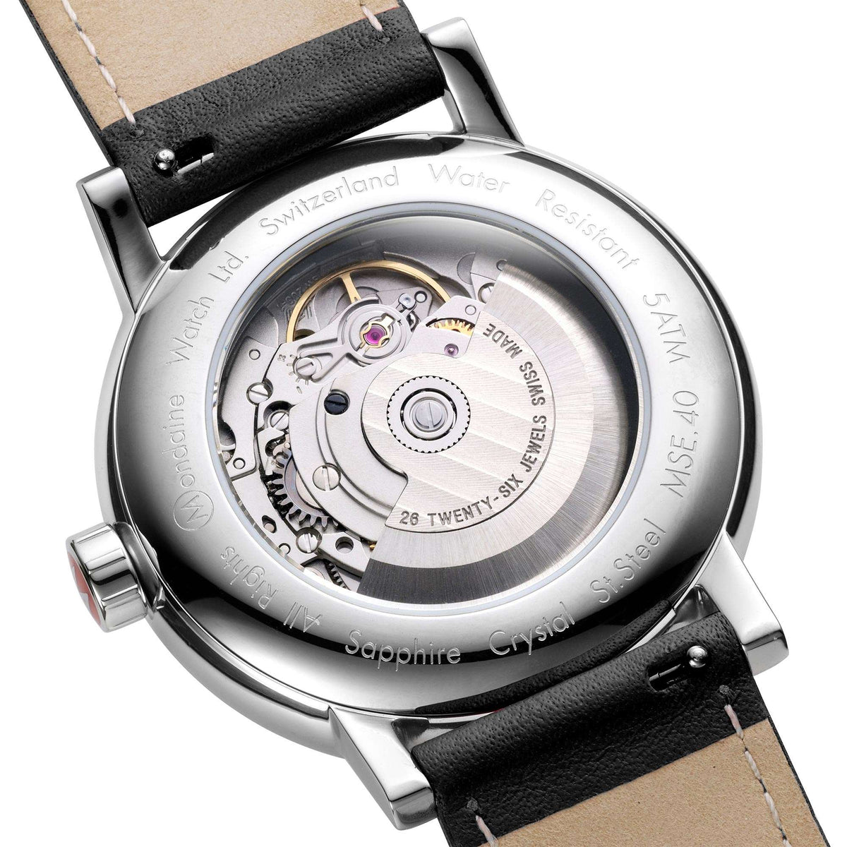 Visible watch movement through case back with black leather strap and round steel bezel