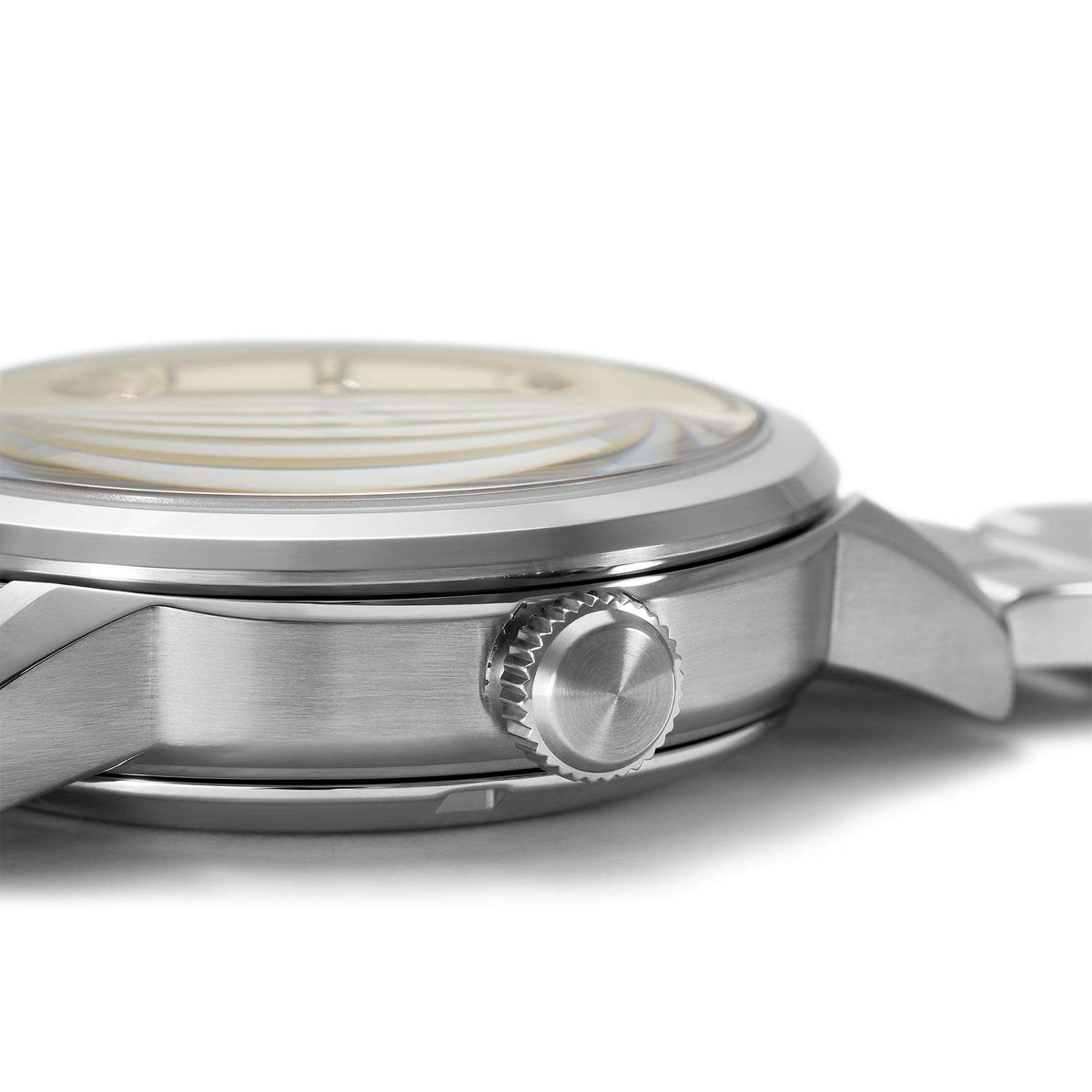 Stainless steel watch case with ridged crown and brushed bezel