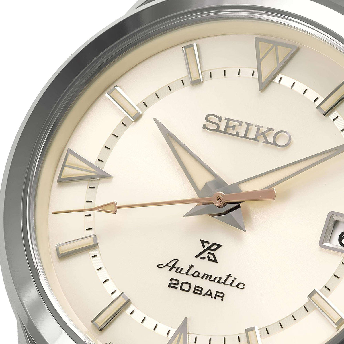 Cream dial automatic watch with triangular hour markers and SEIKO logo