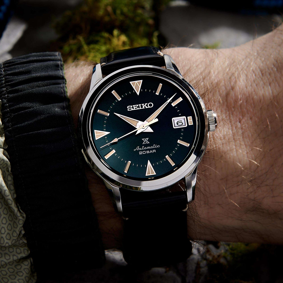 Seiko Prospex Alpinist automatic watch on wrist with green dial and black leather strap