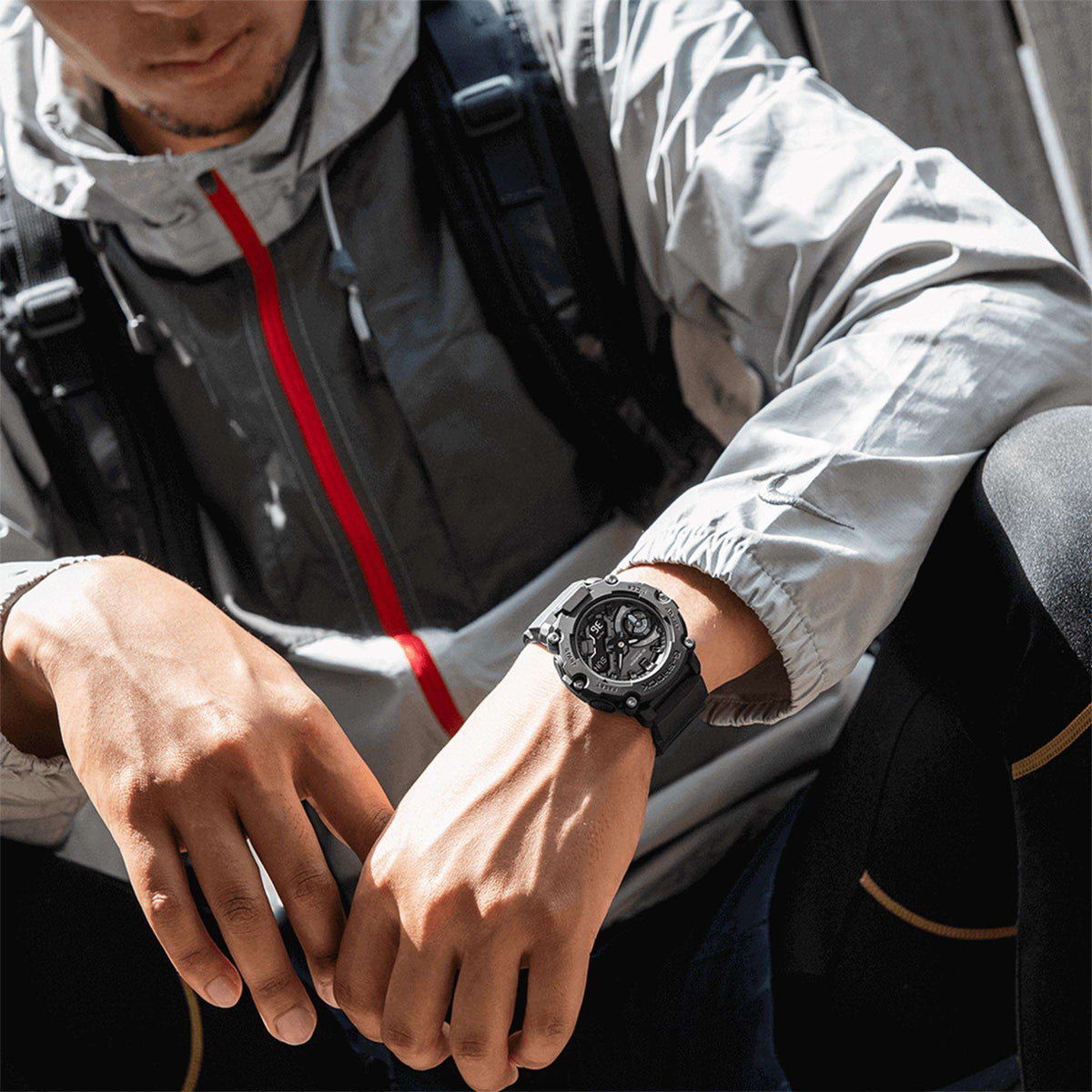 Casio G-Shock watch on wrist with black resin strap and round black dial