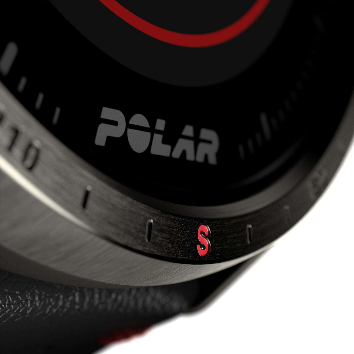 Smartwatch bezel close-up with minute markers and red 'S' accent on dark case.