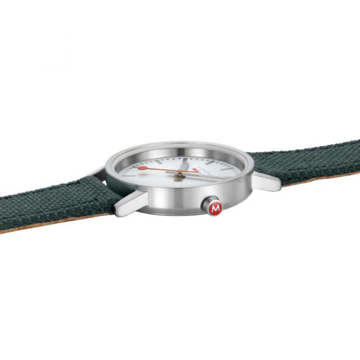 Mondaine quartz watch with green textile strap and silver side profile, crown visible
