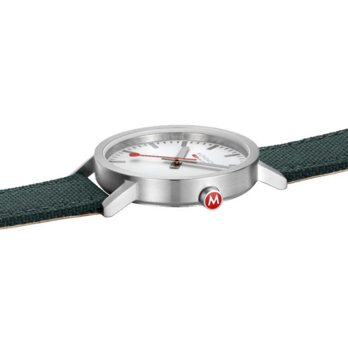 Mondaine quartz watch close-up of round silver case on green textile strap