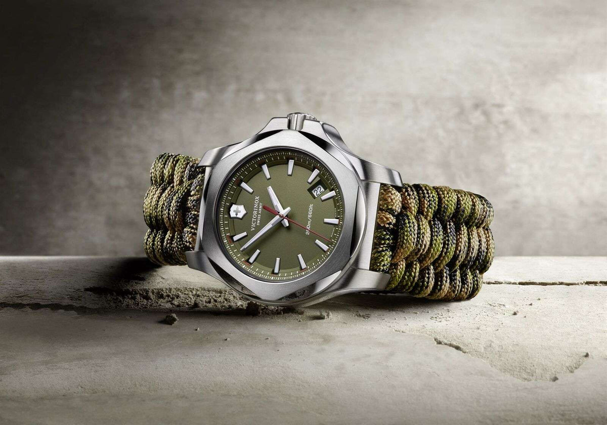 Victorinox I.N.O.X men’s watch side profile, green paracord strap with stainless steel case