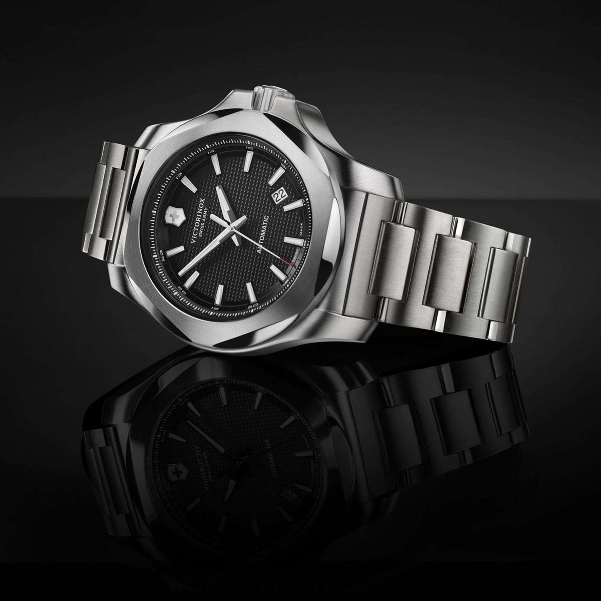 Men's Victorinox mechanical wristwatch with black guilloche dial and steel link bracelet