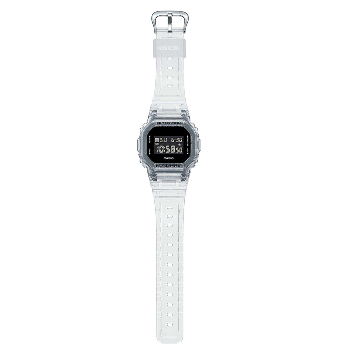 Casio G-Shock watch shown upright with clear strap, black LCD face, and clasp