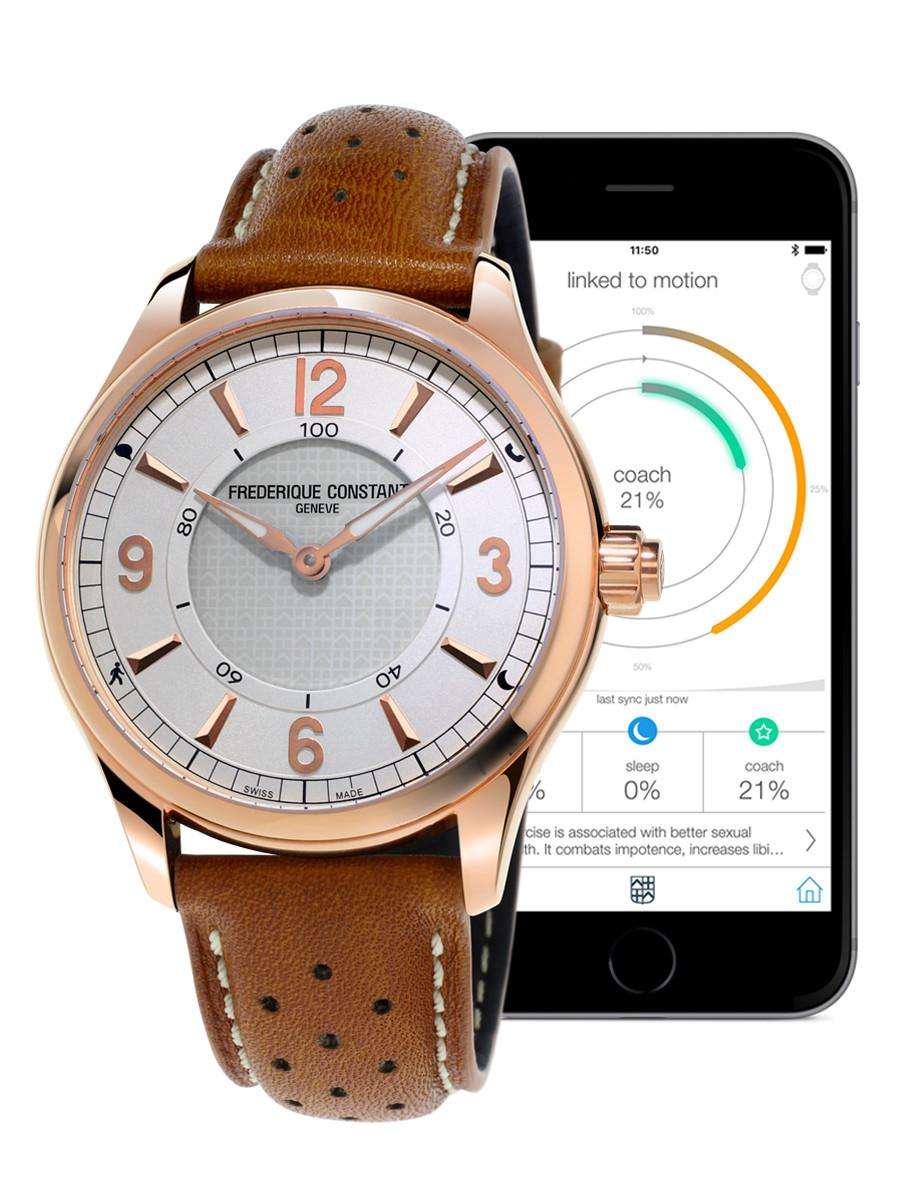 Frederique Constant rose gold smartwatch connected to mobile app displaying activity tracking, coach stats and sleep insights