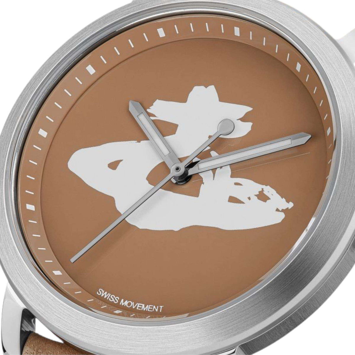 Ladies quartz watch close-up: brown dial with white map graphic, silver case, thin hands