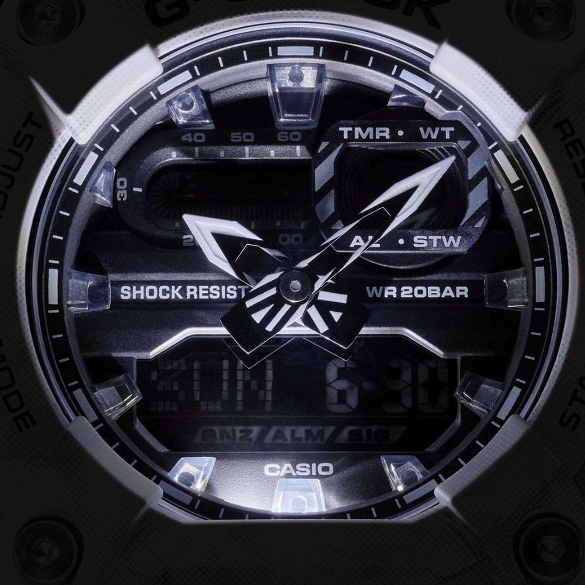 Casio G-Shock dial close-up with black face, “SUN 6:30” display, and “WR 20BAR”