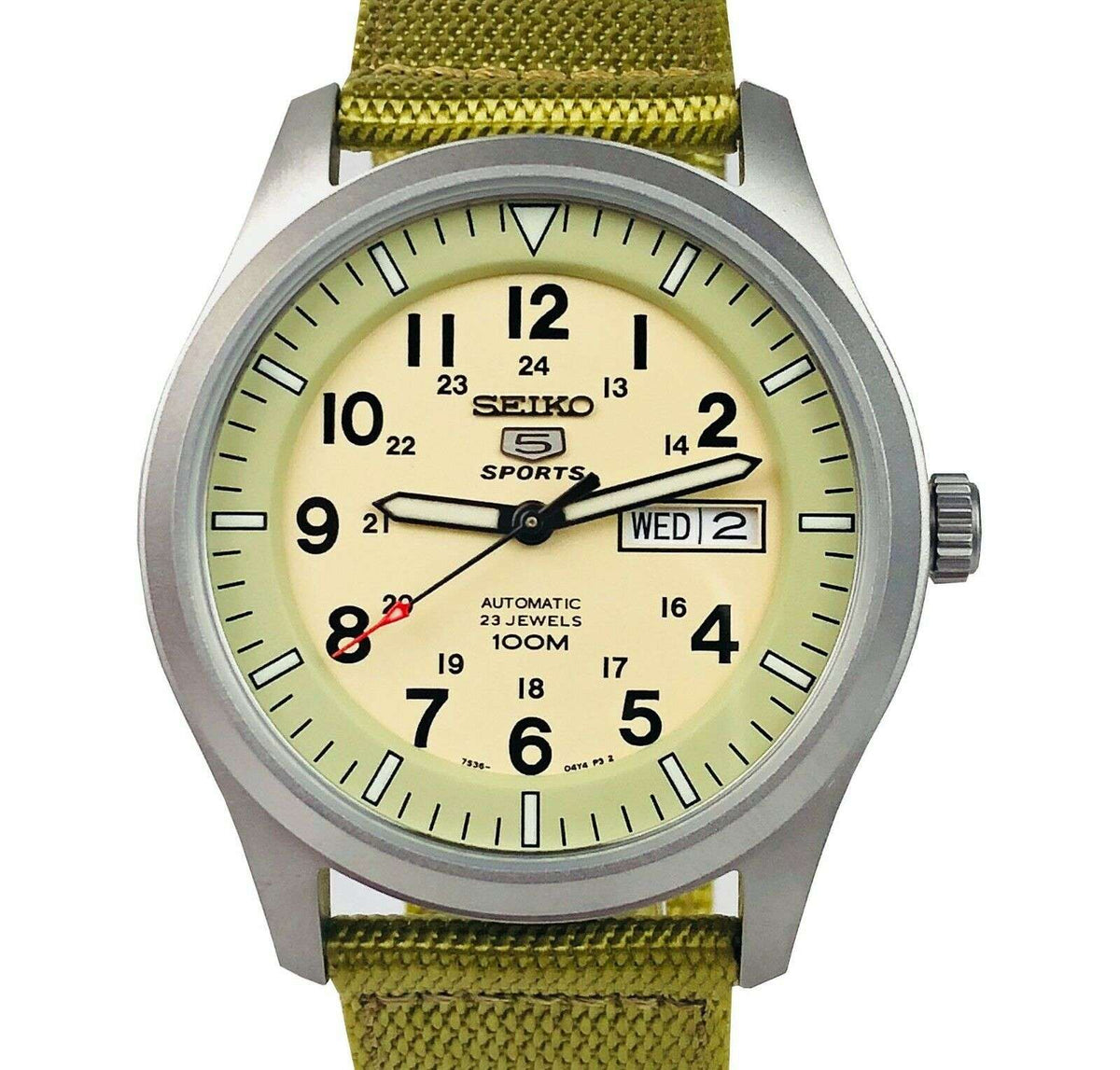 Men’s sports watch front view with cream dial, black markers, and olive canvas strap