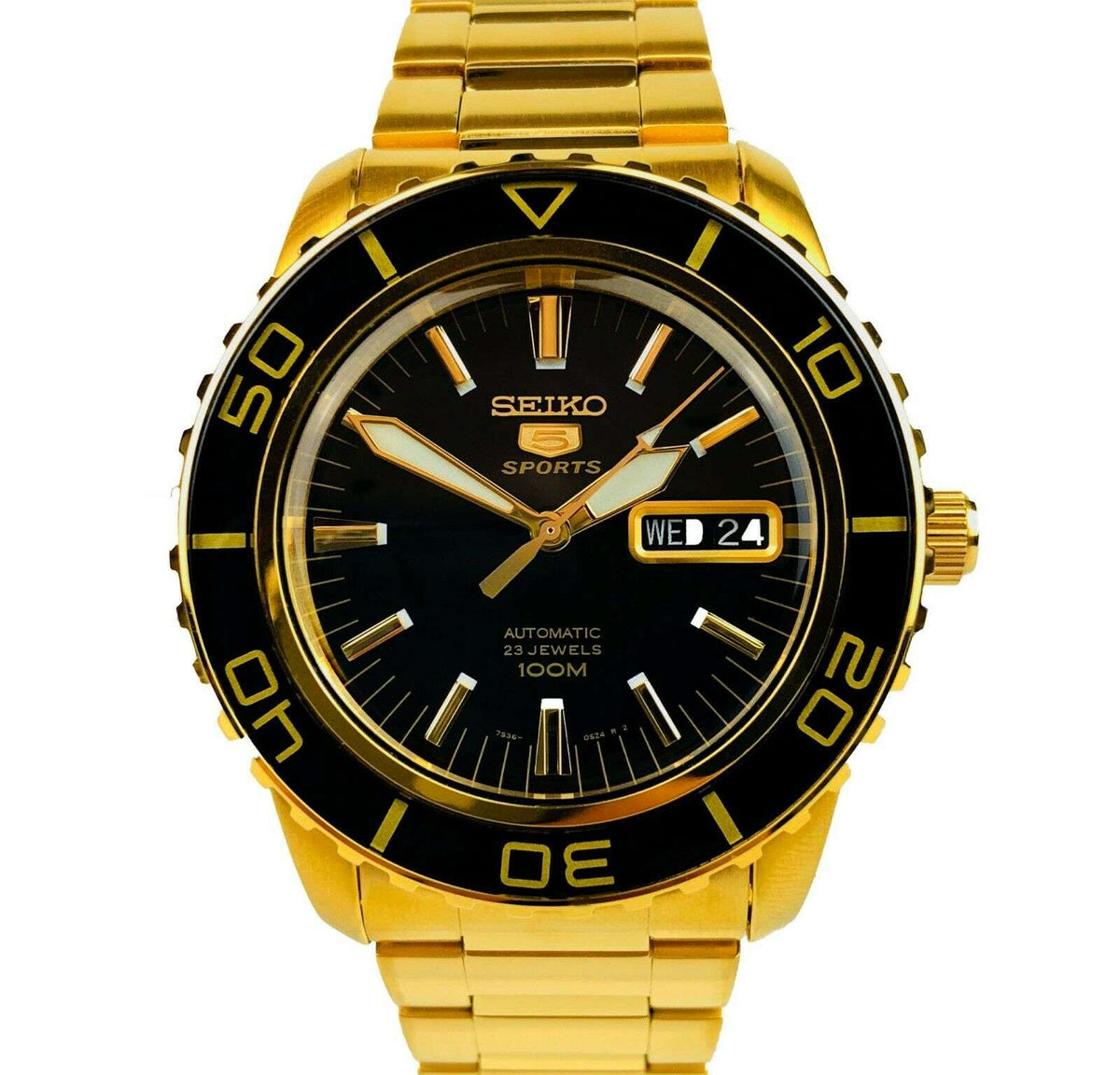 Men's gold-tone Seiko watch with black dial and 'WED 24' date window