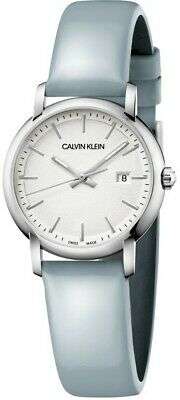 Ladies round watch with white dial and pale blue leather strap