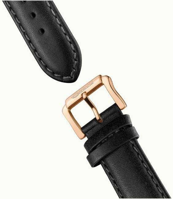 Black leather watch strap with rose-gold buckle and stitched strap end