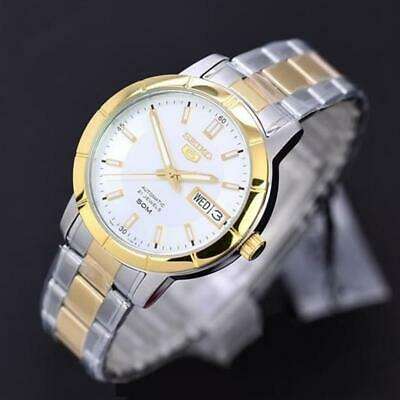 Seiko two-tone stainless ladies watch close-up, white dial with gold hands and markers