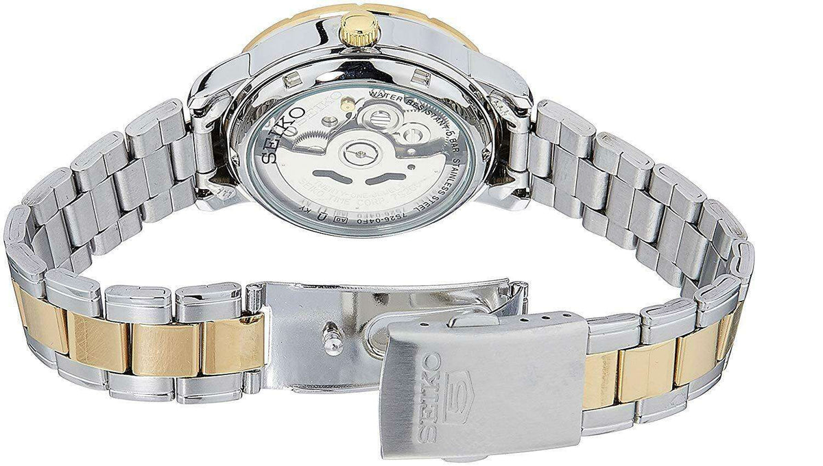 Two-tone stainless steel watch caseback with bracelet links and deployment clasp