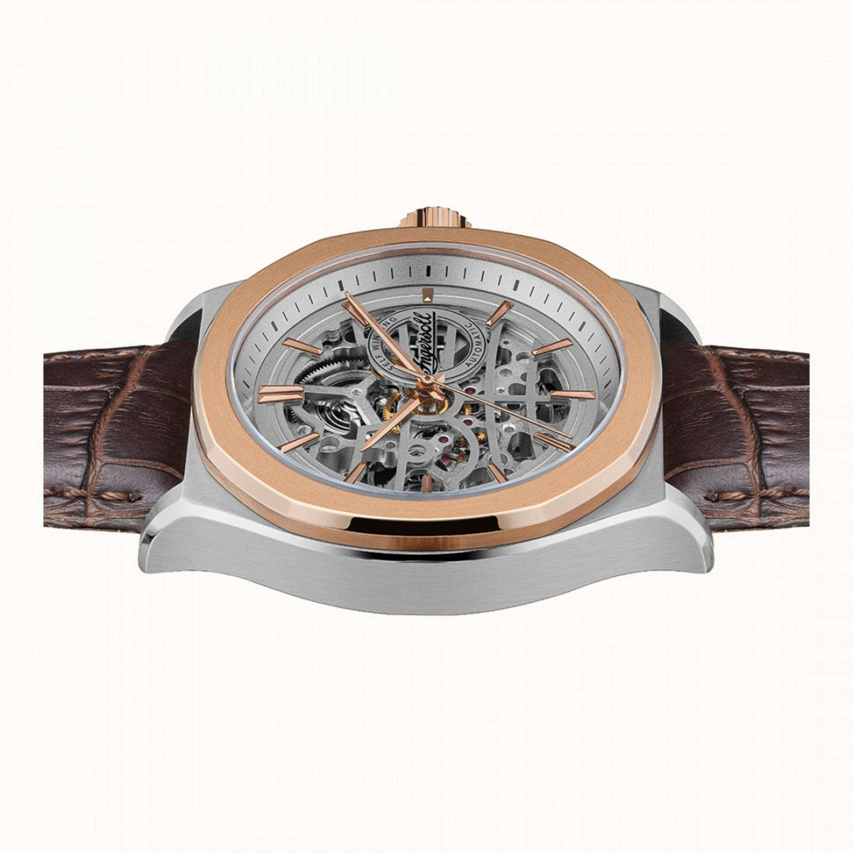 Automatic skeleton watch front view, grey dial, rose-gold bezel, brown leather strap