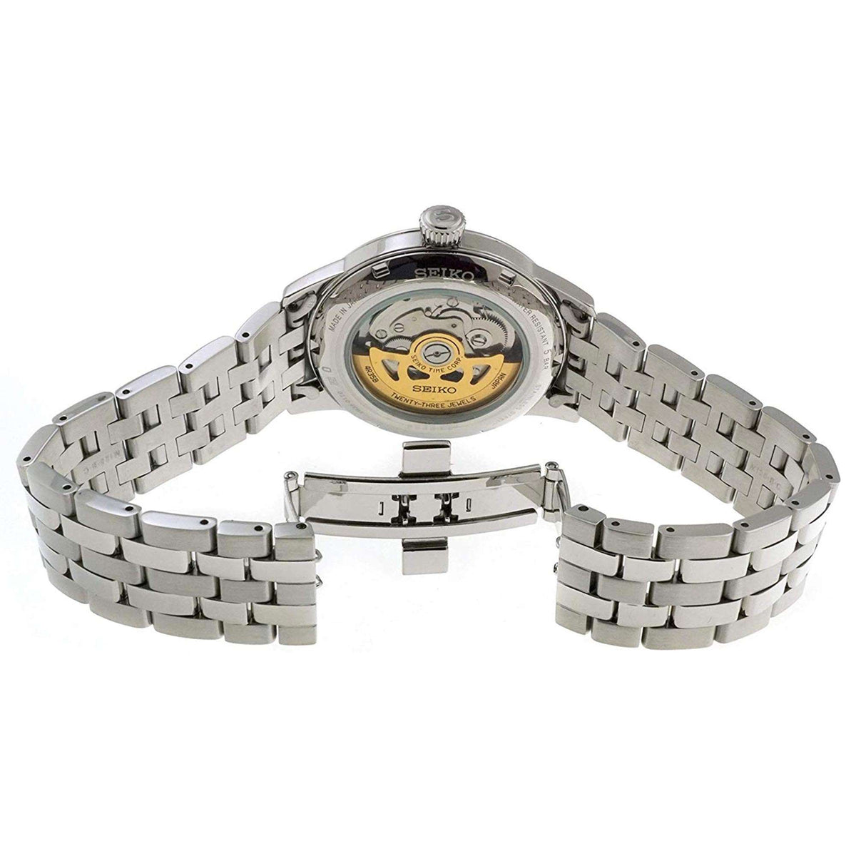 Silver stainless steel automatic watch with visible movement on open caseback