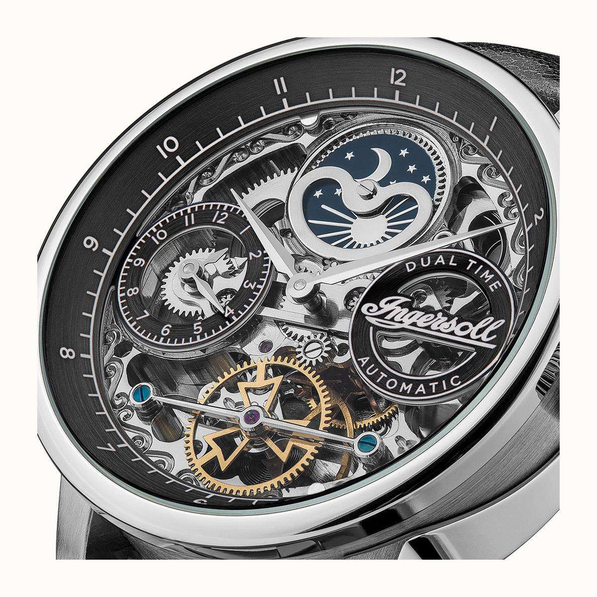 Men's automatic skeleton watch close-up with moon phase dials and dual time text