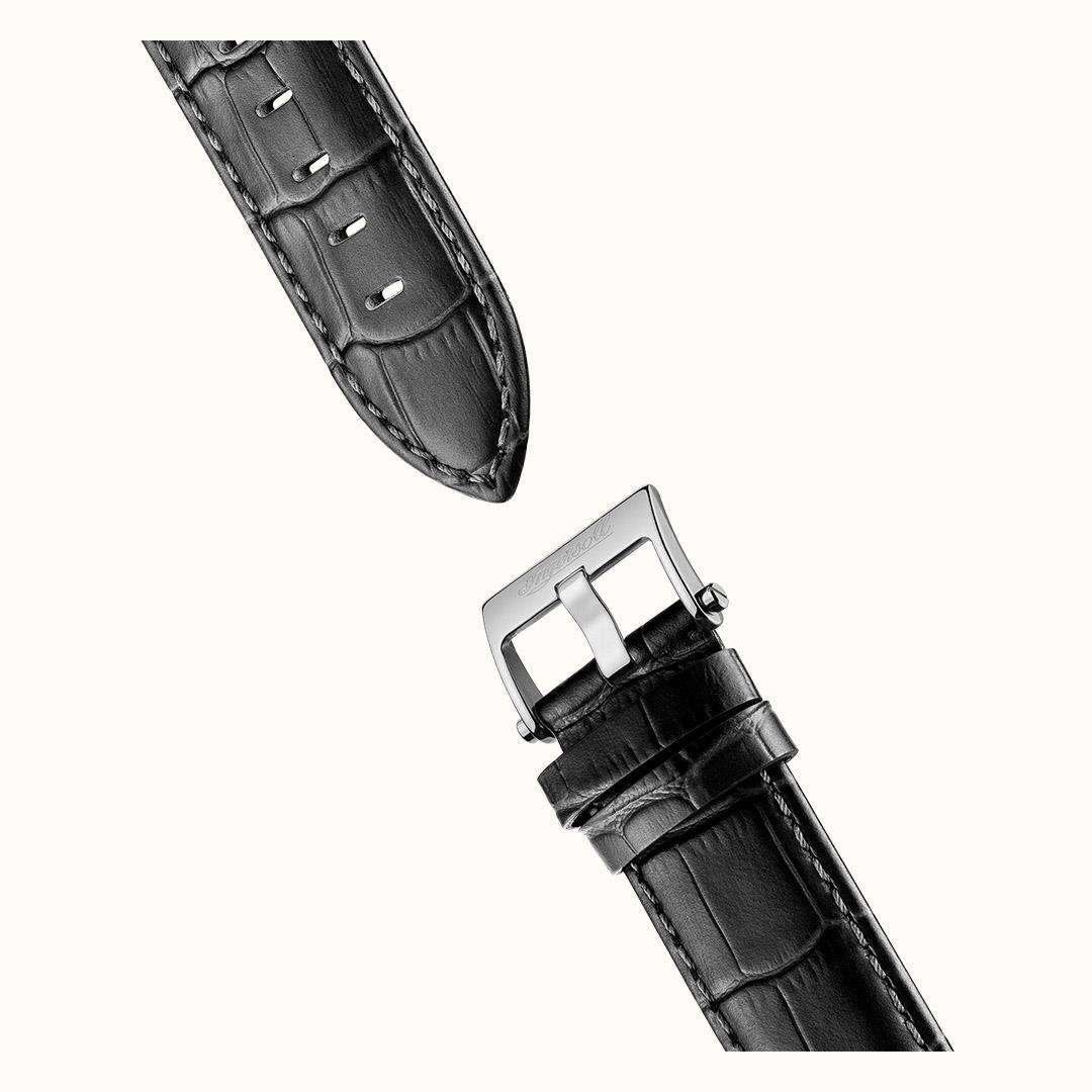 Black leather watch strap with silver buckle and stitched edges
