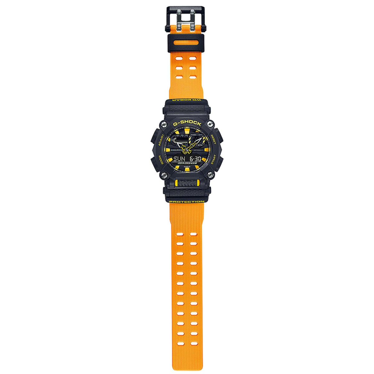 Men's black and yellow sport wristwatch with dial details on long orange resin strap