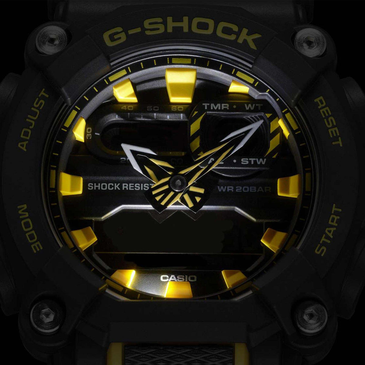 Men's G-Shock quartz watch face, black dial with yellow markers, digital time at 6:30, resin case