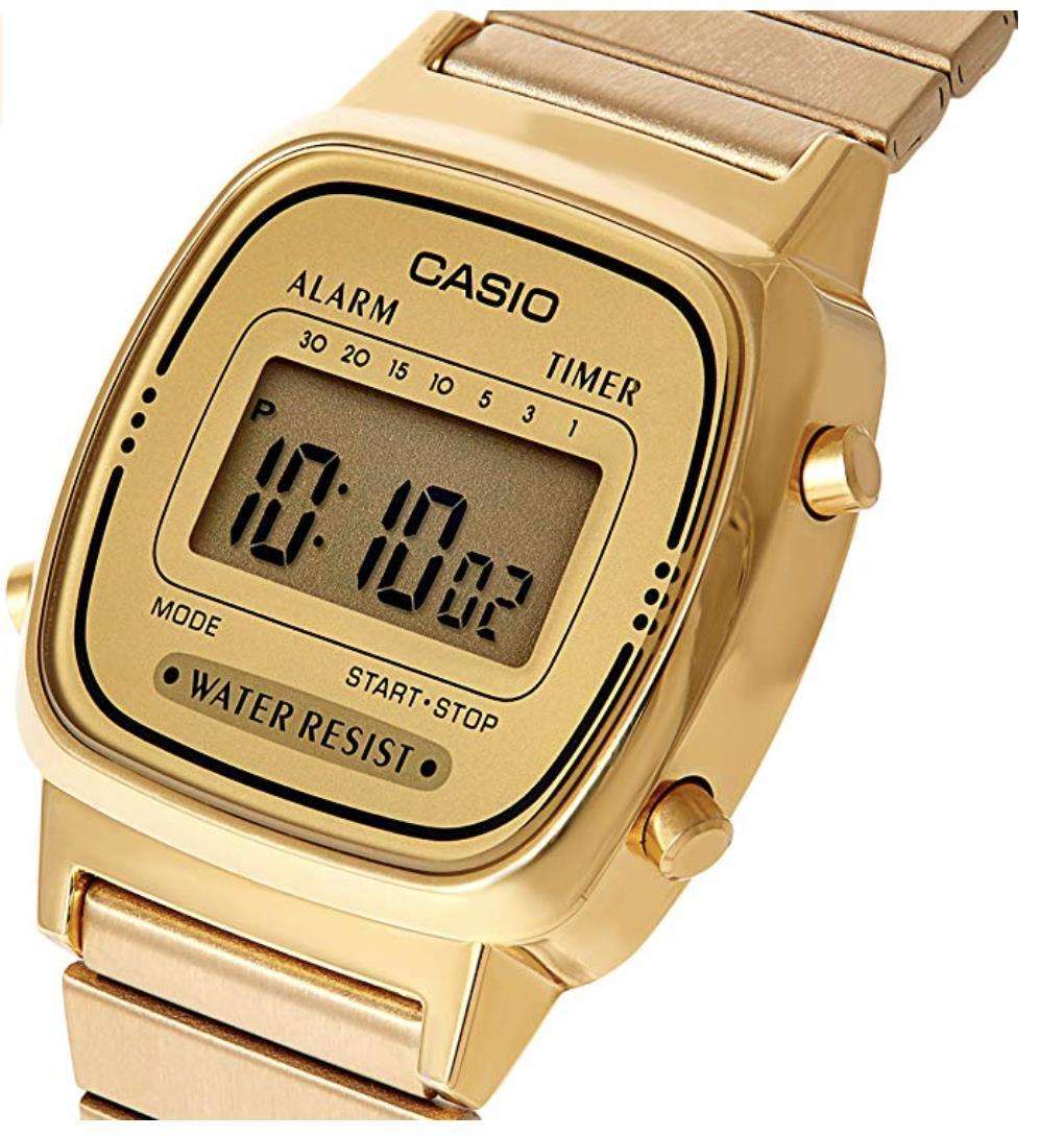 Gold-tone ladies digital watch, LCD display showing 05:58 with alarm and timer