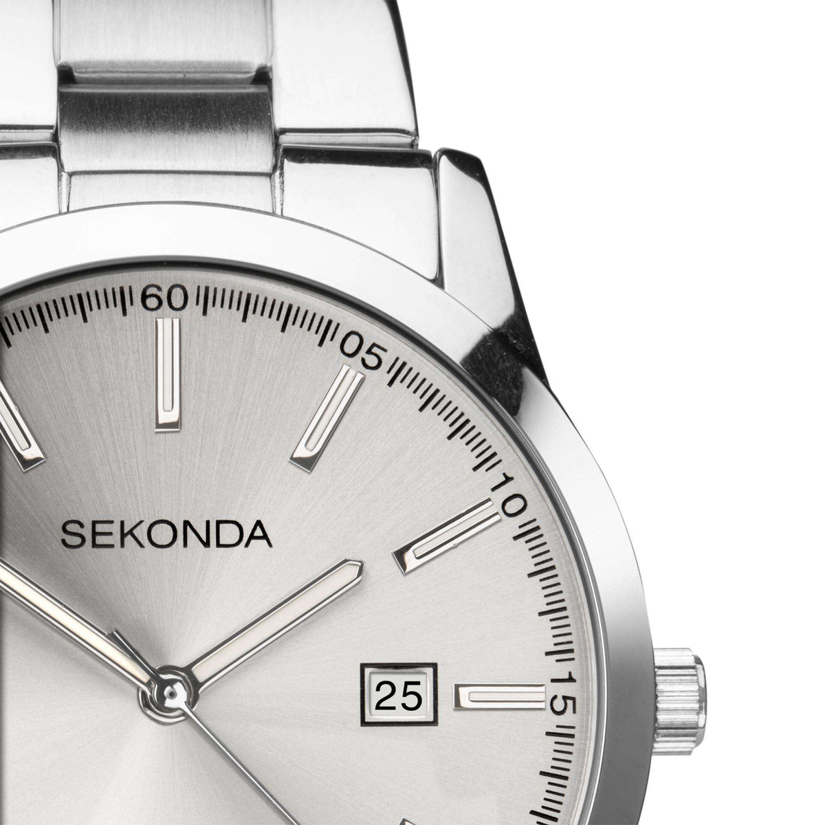 Close-up of silver dial stainless watch with date window at 25