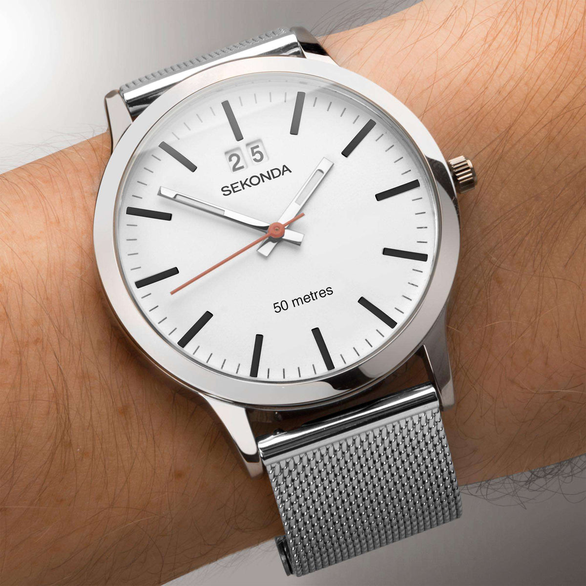 Men's silver wristwatch with white dial, black hour markers, red seconds hand, mesh band.