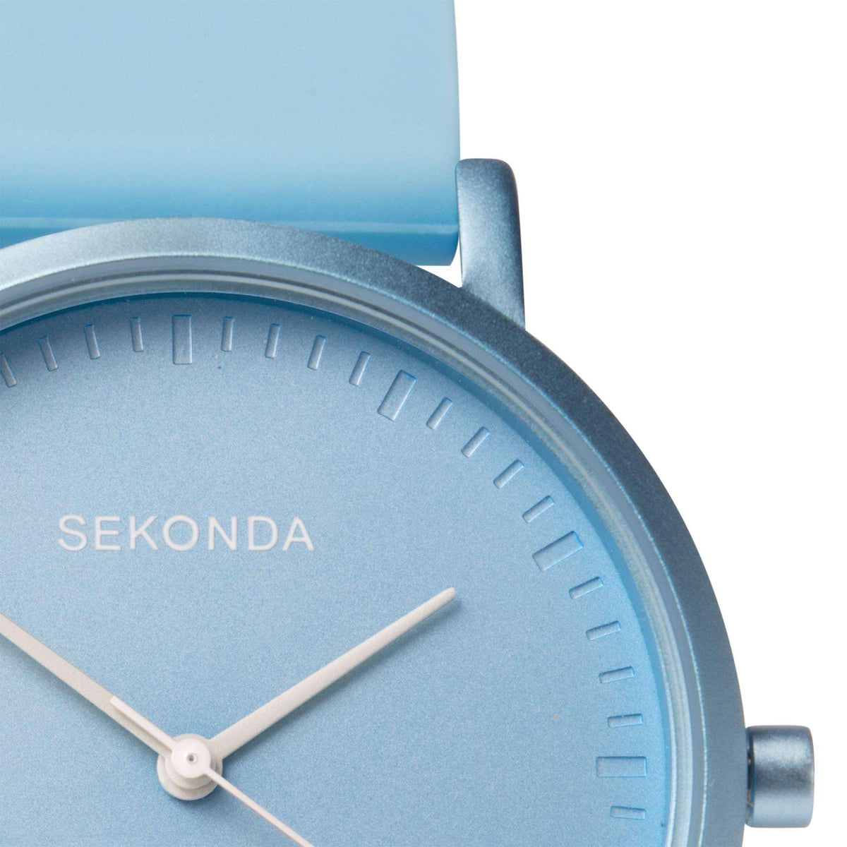 Light blue quartz watch face with stick hour markers, three hands, and blue bezel on strap.