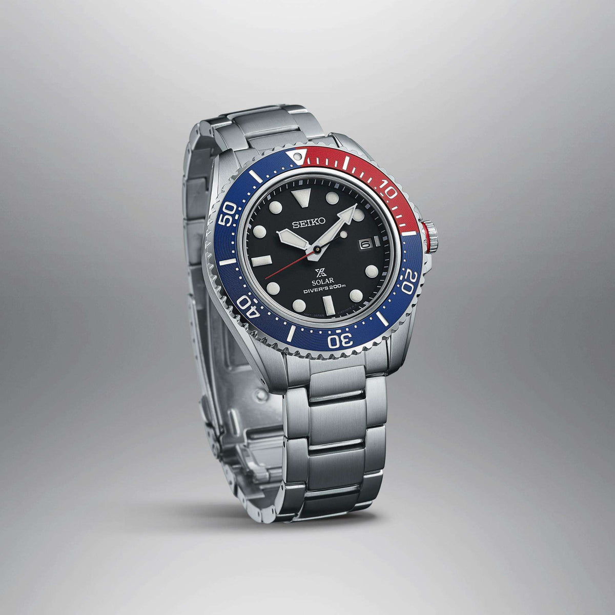 Men's stainless steel diver watch, black dial with blue-red bezel and metal bracelet