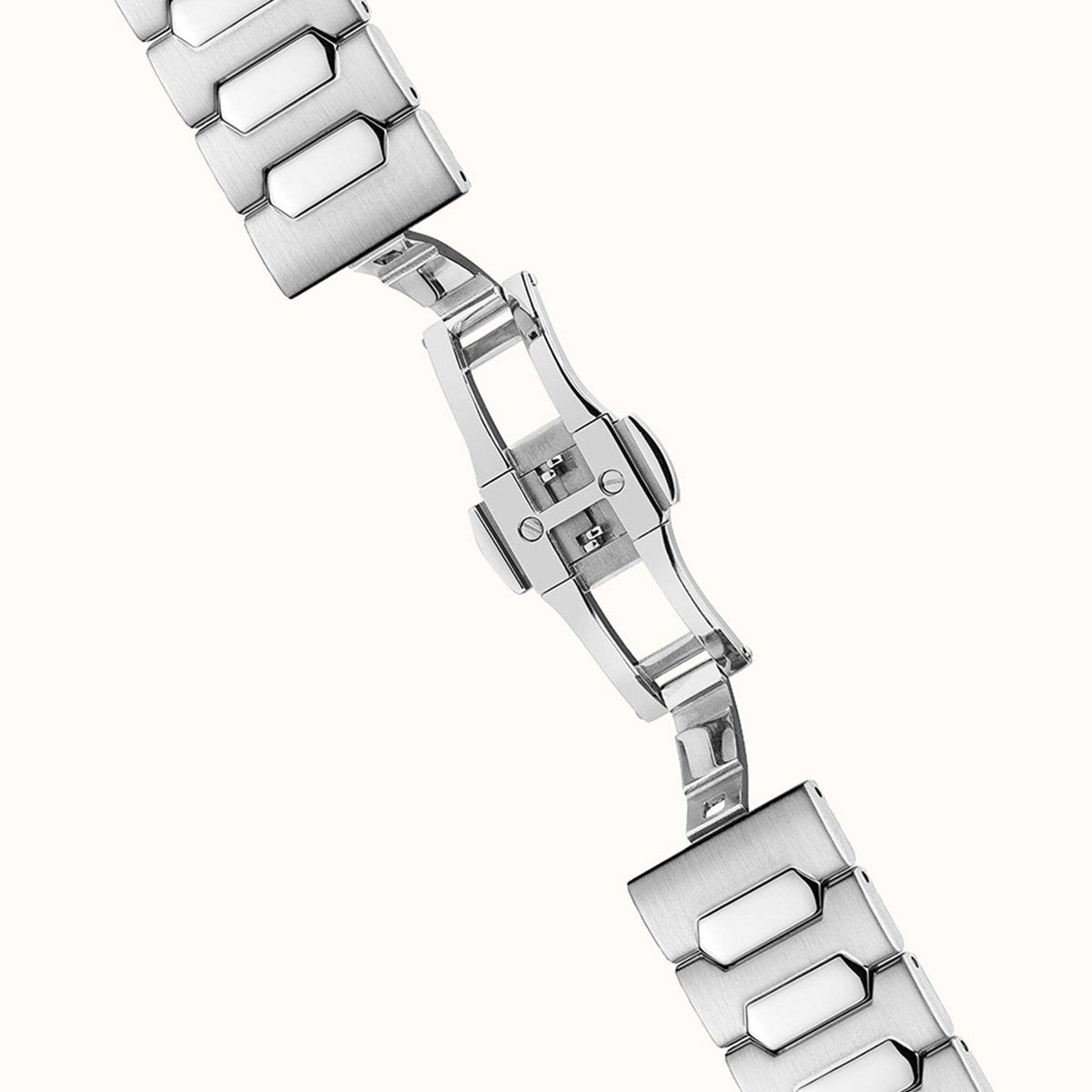 Stainless steel watch bracelet with hex link segments and clasp close-up for fit details.