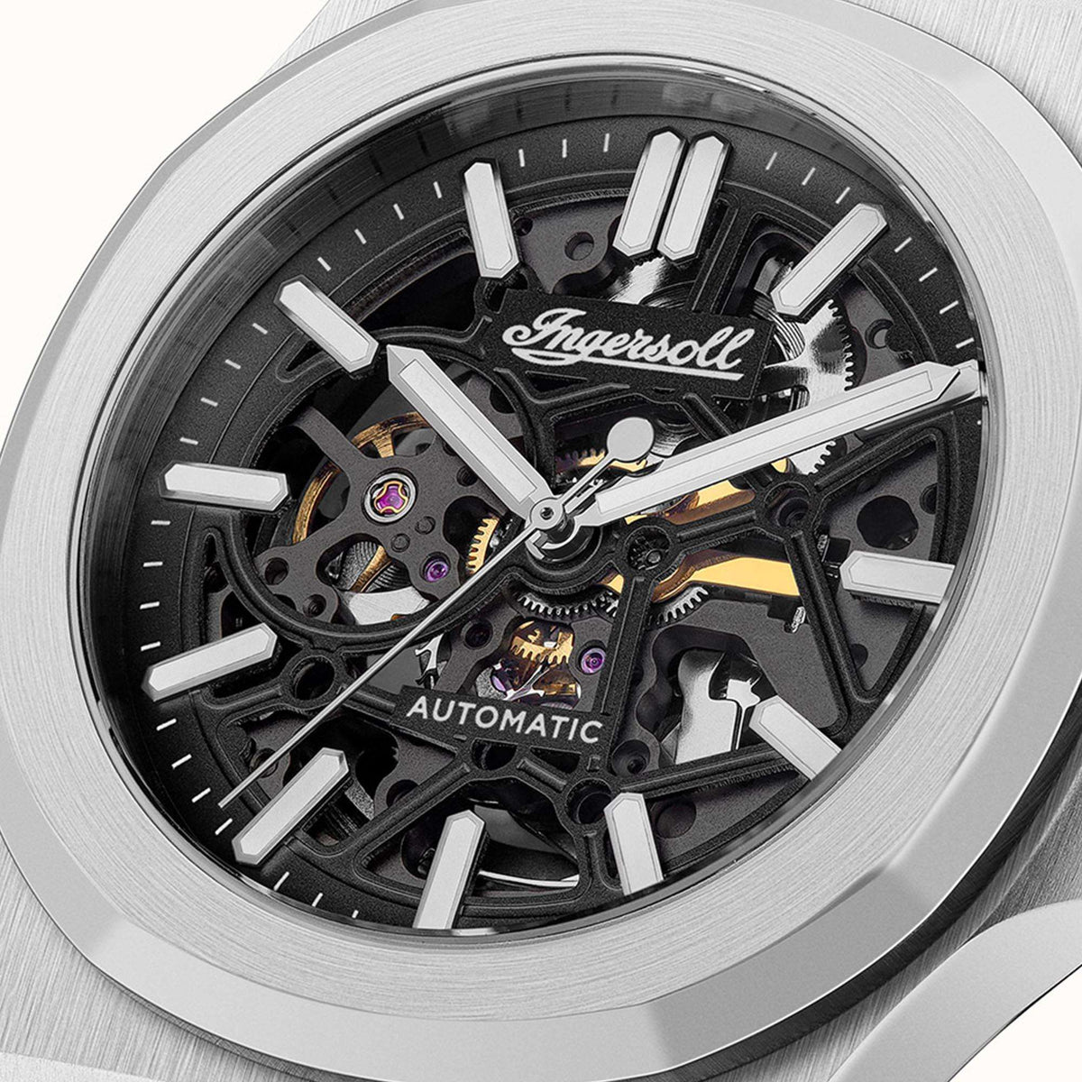 Men's automatic watch with black dial and visible skeleton movement under a clear crystal.