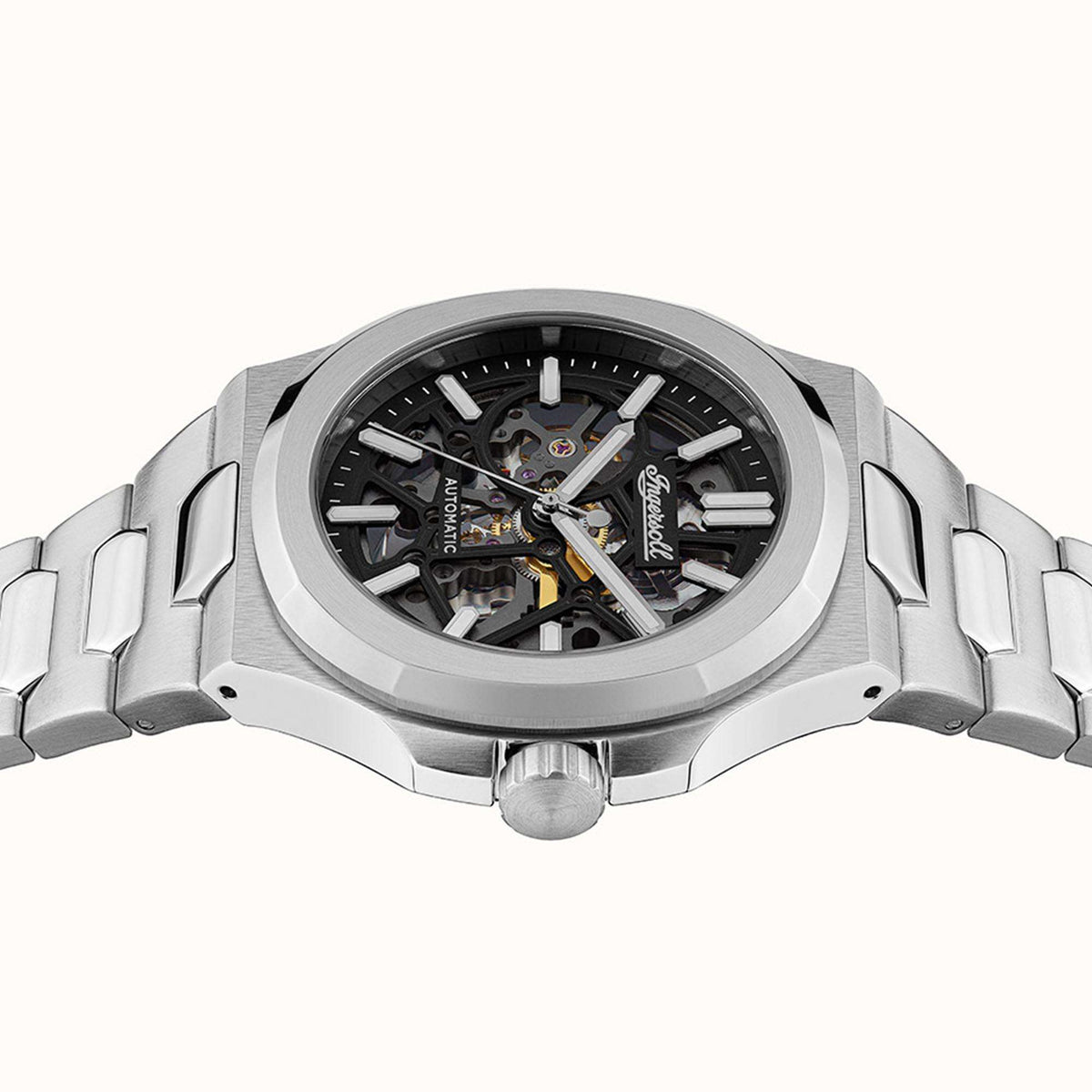 Men's automatic watch with stainless steel case and bracelet, angled view of the dial.