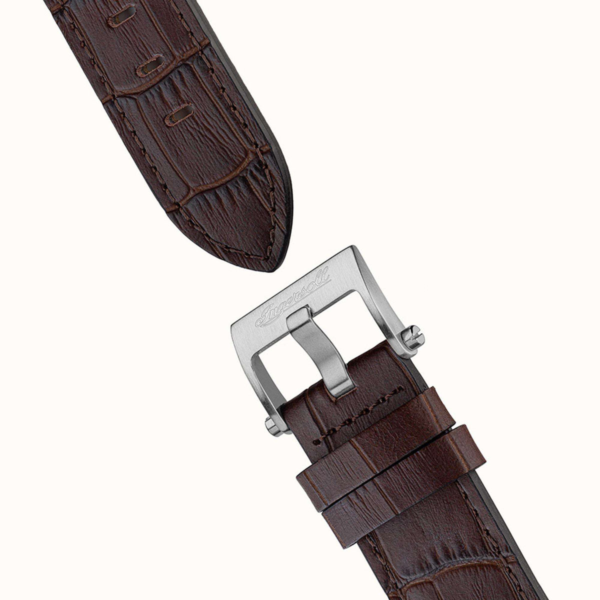 Brown leather watch strap with metal buckle clasp, shown from side angle