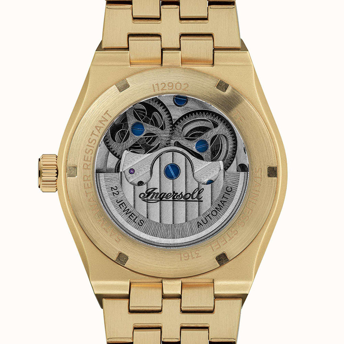 Gold-tone automatic skeleton men's watch caseback with exposed gears and blue accents