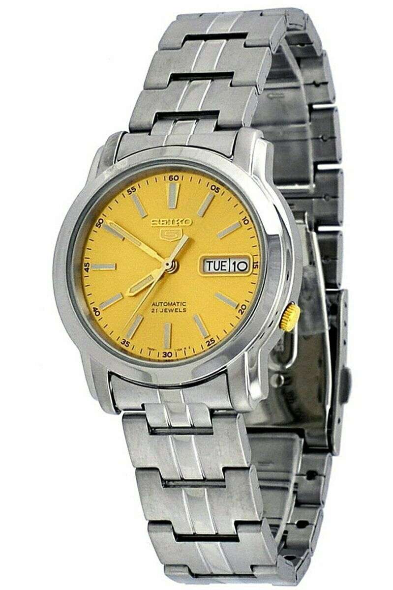 Men's automatic watch with gold dial on stainless steel bracelet, side view showing crown and TUE 10