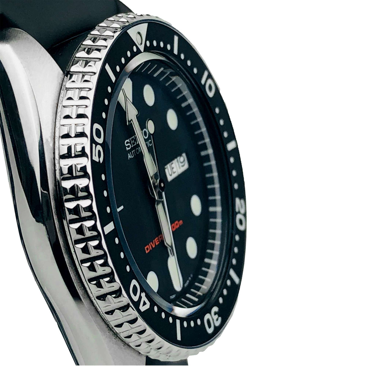 Men's Seiko SKX diver watch angled view, black dial and knurled dive bezel