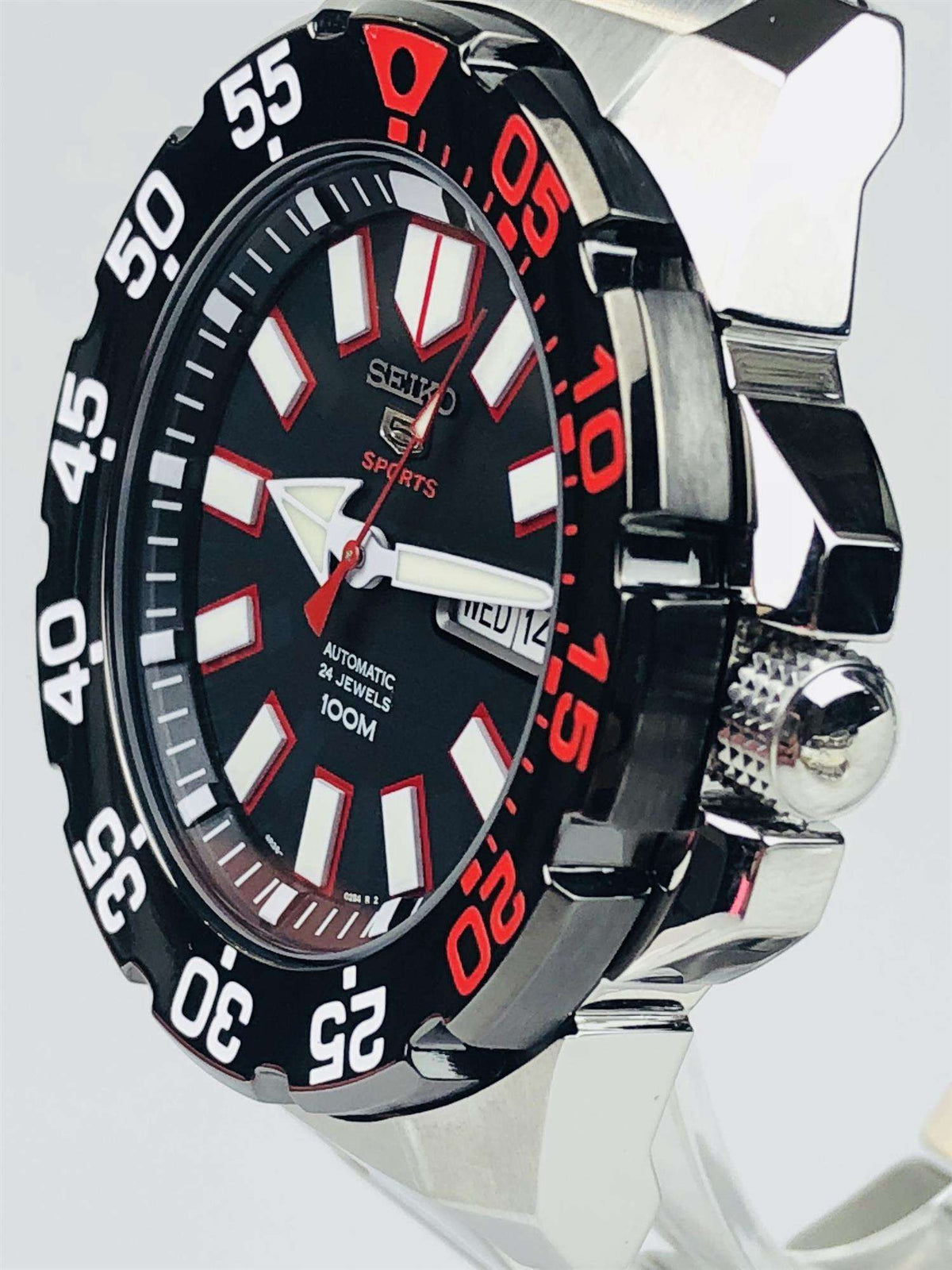 Men's stainless steel Seiko Sports automatic watch, black dial with red bezel markings