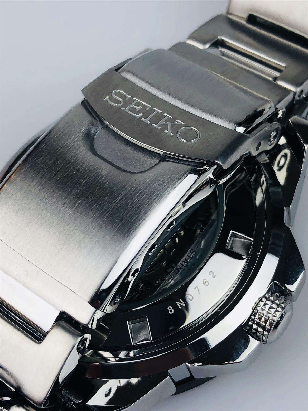 Seiko stainless steel watch bracelet clasp and case with engraved SEIKO logo