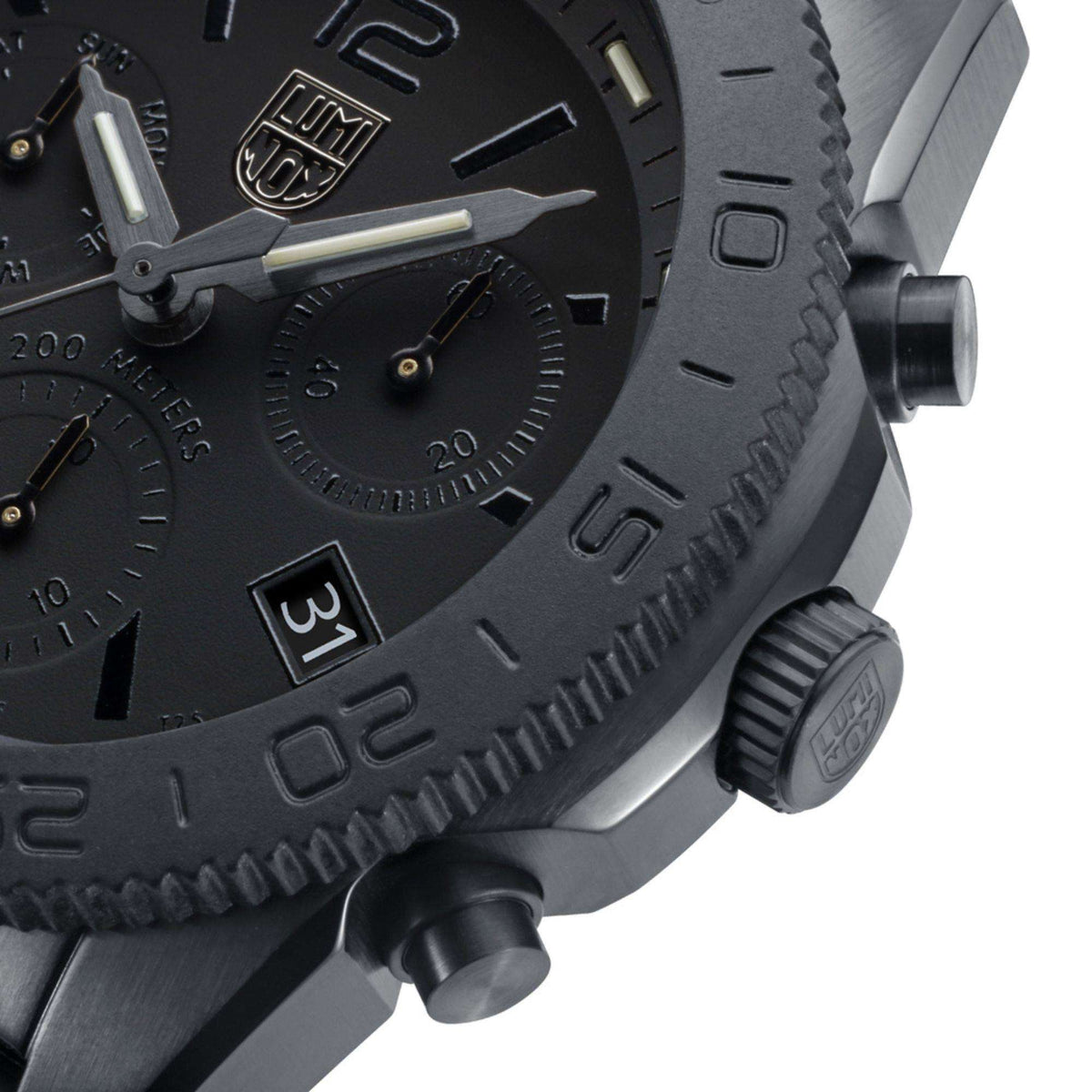 Black chronograph diver watch side with crown, pushers, and textured bezel edge
