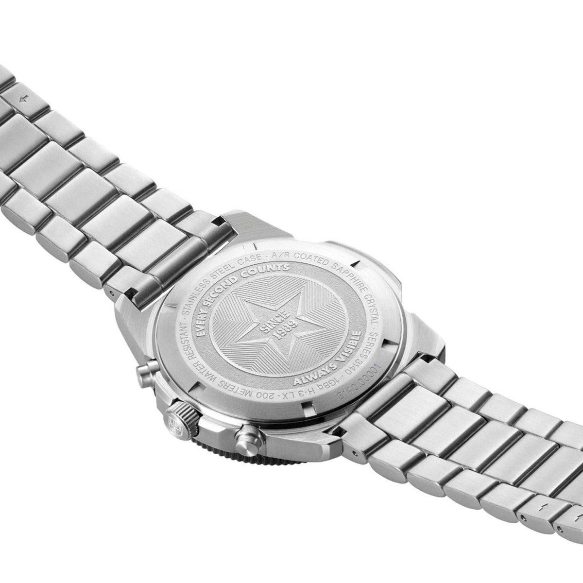 Stainless steel watch case back with engraved text and ridged edge