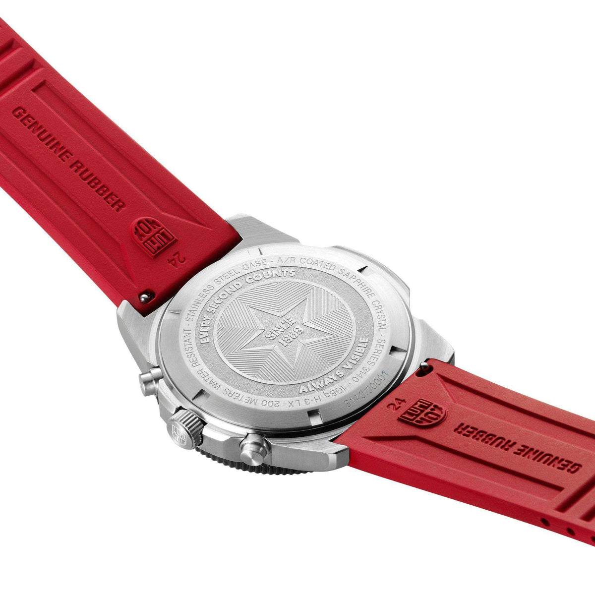 Men's diver chronograph watch close-up: stainless case back with star, red rubber strap